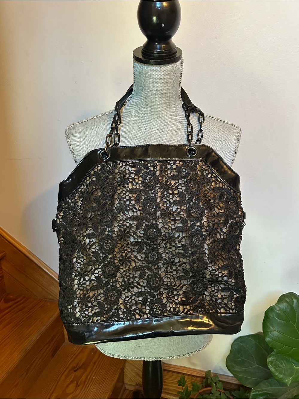 Black lace and leather tote bag with chain handles